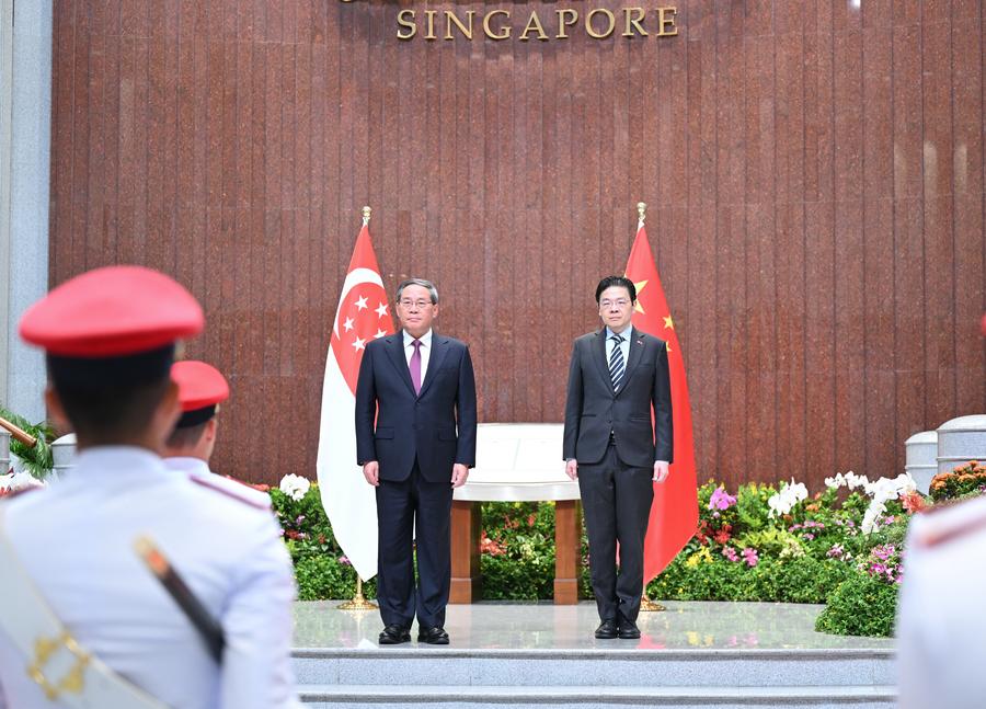 Chinese premier pledges joint efforts with Singapore for more just, equitable world order-Xinhua