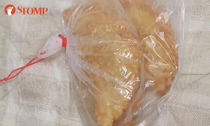 Man shocked by cost of curry puffs at new Teck Whye stall instead of usual 3 for 