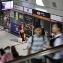 Passengers welcome free off-peak rail rides, but say more can be done to ease NEL congestion