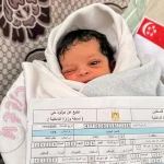 Palestinian baby girl in Gaza named Singapore