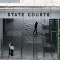Man accused of choking baby, hanging him in cupboard switches lawyers