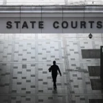 After 33 years on the run, former loan shark, now 80, is convicted over fatal stabbing