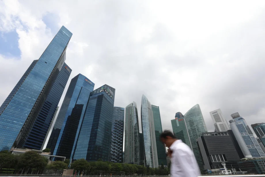 With S$/US$ parity on horizon, should investors go long on Singapore real estate, short overseas property?