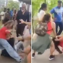 Woman caught on video dragging and stomping another during fight
