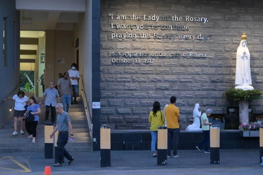 Churchgoers calm as mass resumes at St Joseph’s Church, 1 day after suspicious item was found