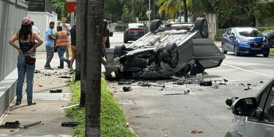 Female driver sent to hospital after car flips over in Katong, she’s assisting police investigations