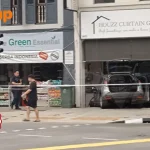 Car crashes into shophouse after collision at Geylang Road, driver assisting with investigations
