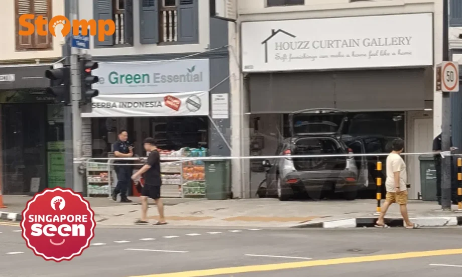 Car crashes into shophouse after collision at Geylang Road, driver assisting with investigations Car crashes into shophouse after collision at Geylang Road, driver assisting with investigations