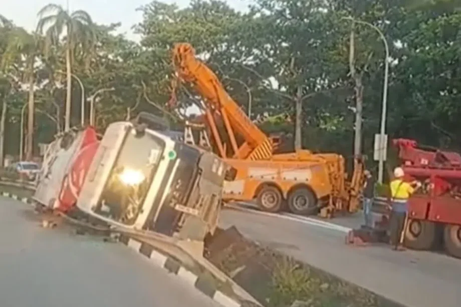 Driver taken to hospital after tipper truck skids into drain along ECP slip road Driver taken to hospital after tipper truck skids into drain along ECP slip road