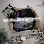 S’pore-registered car crashes into several houses in JB; driver taken to hospital
