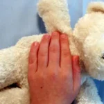 Man charged with molesting his 9-year-old son while boy was asleep