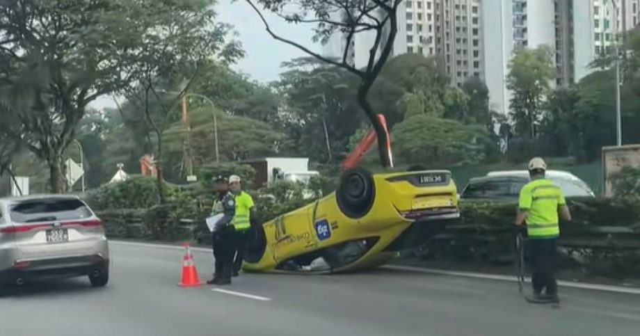 Taxi overturns in PIE crash, cabby and passenger taken to hospital, Singapore News Taxi overturns in PIE crash, cabby and passenger taken to hospital, Singapore News