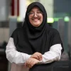‘Living the dream’: Why a young lawyer chooses to serve migrant workers full-time