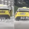 ComfortDelGro investigating after taxi seen travelling with open door
