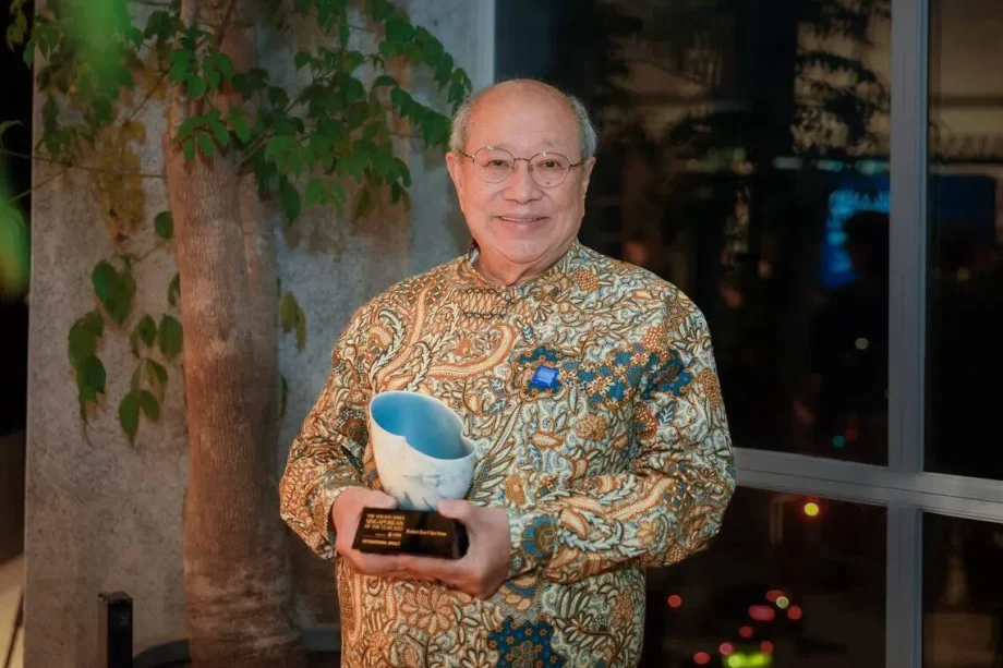 Retiree running charity given first ST Singaporean of the Year international impact award