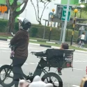 ‘Cute, dangerous or stupid?’: Baby seen in delivery bag on back of e-bike at Fernvale Link