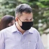 DSO assistant manager charged with accepting bribes of at least 0k cash and gifts over 10 years