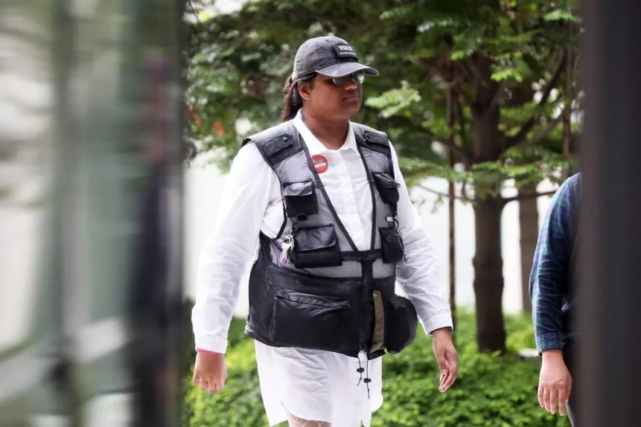 Man charged with using criminal force on Singapore police