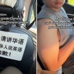 Grab passenger says sign in vehicle is discriminatory, driver suspended
