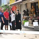 Accused in Geylang murder brought back to crime scene
