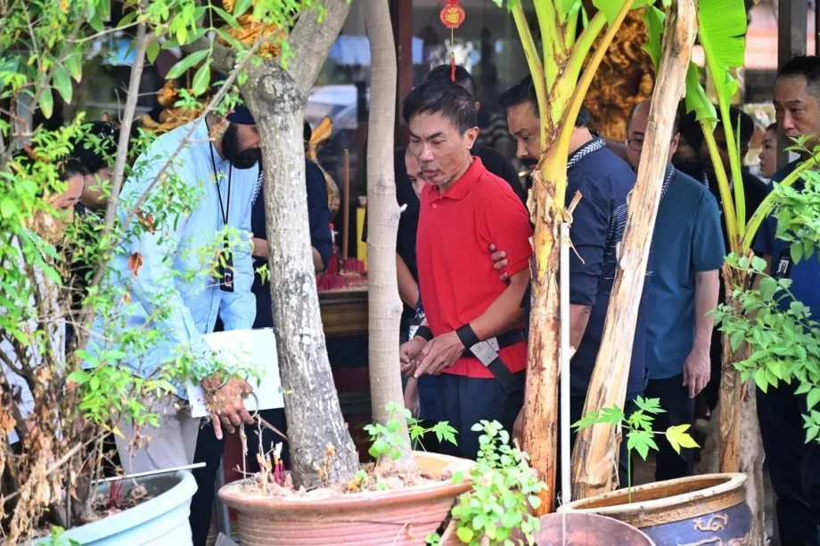 Suspect in Geylang murder brought back to crime scene