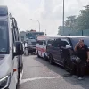 70-year-old among four taken to hospital after accident involving private ambulance on KJE