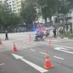 Driver arrested, cyclist injured after accident near YewTee Point