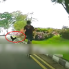 Cyclist seen riding against traffic on ECP service road, sticks out leg at oncoming vehicle, Singapore News