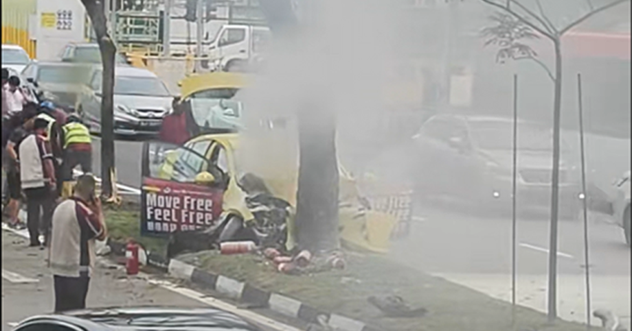 Taxi catches fire after crashing into tree in Hougang; 2 taken to hospital, Singapore News Taxi catches fire after crashing into tree in Hougang; 2 taken to hospital, Singapore News