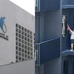 Domestic helper seen standing on 24th-floor ledge to clean windows at Lentor Modern