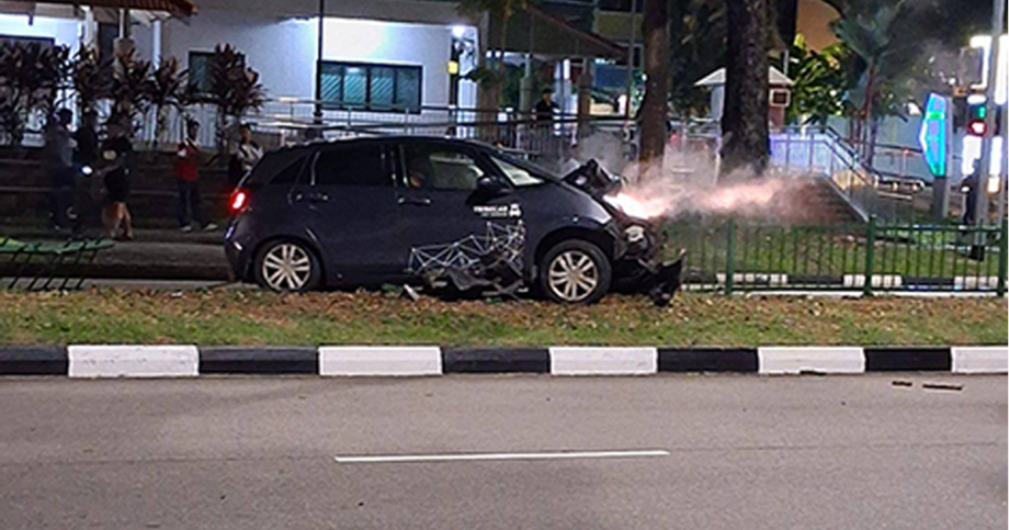 Tribecar vehicle mows down centre railings along road in Yishun, believed to have skidded, Singapore News Tribecar vehicle mows down centre railings along road in Yishun, believed to have skidded, Singapore News