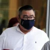 Jail term cut for man who gave bribes to SMU academy staff