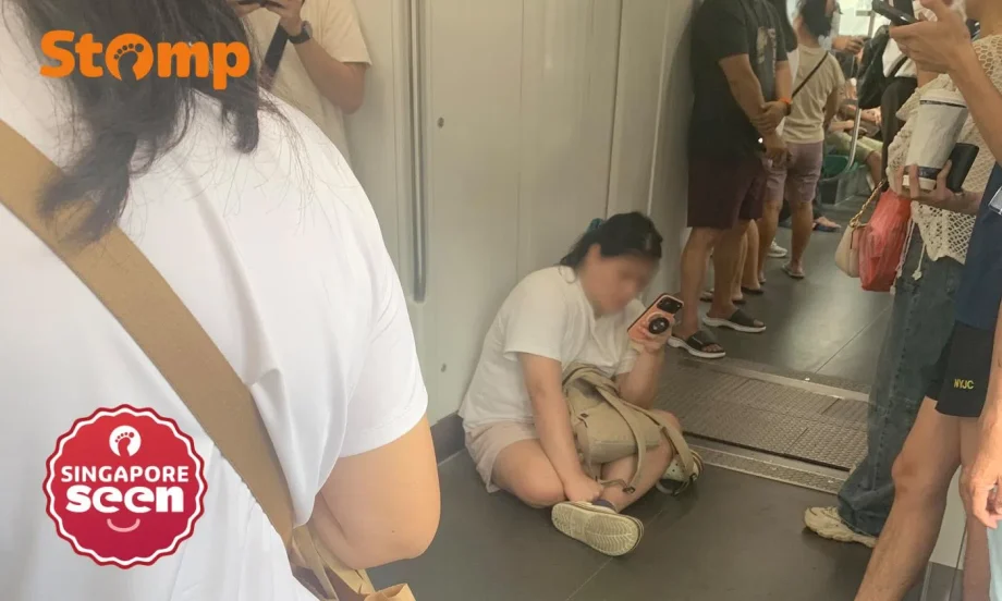 Singapore train floor sitting rule ignored Singapore train floor sitting rule ignored