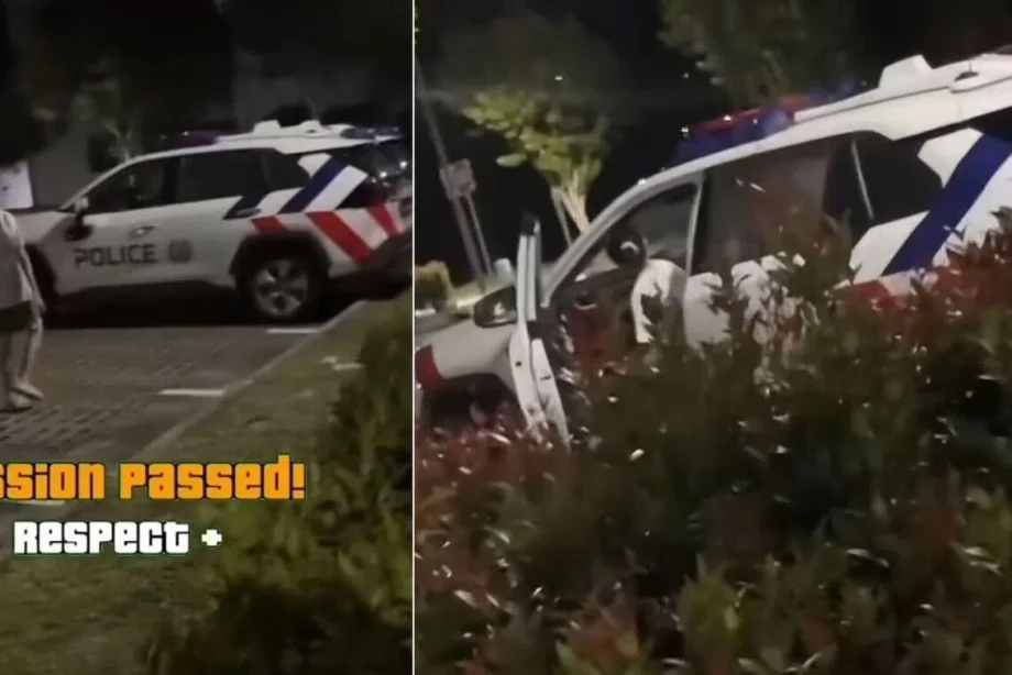 Woman assisting with investigations after entering police car