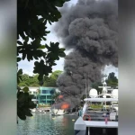 Luxury yacht at Sentosa Cove marina catches fire