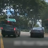 Car squeezes past police van during right turn to get ahead but gets pulled over , Singapore News