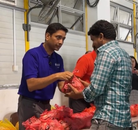 Singapore minister hands out groceries to unpaid workers, as MoM comes to rescue Singapore minister hands out groceries to unpaid workers, as MoM comes to rescue