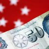 Analysts say Singapore dollar set to gain despite hawkish Fed