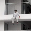 Man arrested after HDB ledge rescue
