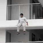 Man arrested after HDB ledge rescue