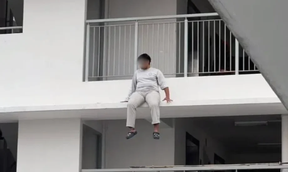 Man arrested after HDB ledge rescue Man arrested after HDB ledge rescue