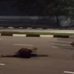 Man arrested for public drunkenness after stopping traffic, lying on road in Admiralty Road West