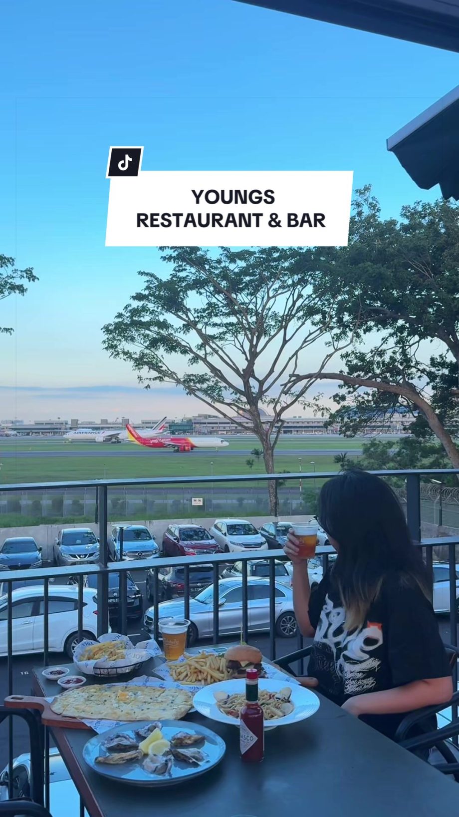 @middleclass.sg Restaurant and bar in Changi with view of airplanes  YOUNGS Rest…