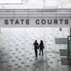 China woman jailed over use of fake passport to enter Singapore; husband jailed for false declarations