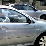 Jail, fine for those caught holding a phone while driving on S’pore roads under proposed law