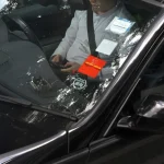 askST: Why do proposed laws ban holding a phone while driving?