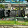 Three workers taken to hospital after garbage truck skids and flips over in Yishun