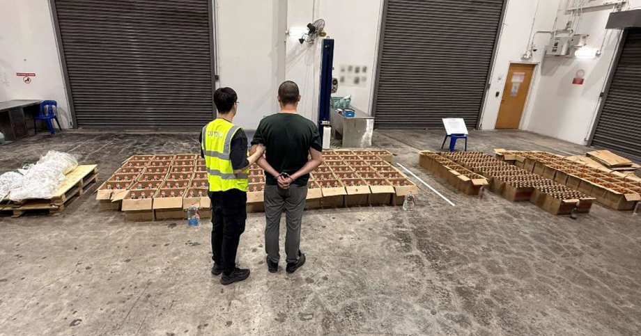 Customs arrest Chinese national, seize 1,188 bottles of duty-unpaid liquor in Kaki Bukit, Singapore News