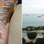 Sentosa beach fun cut short by black substance