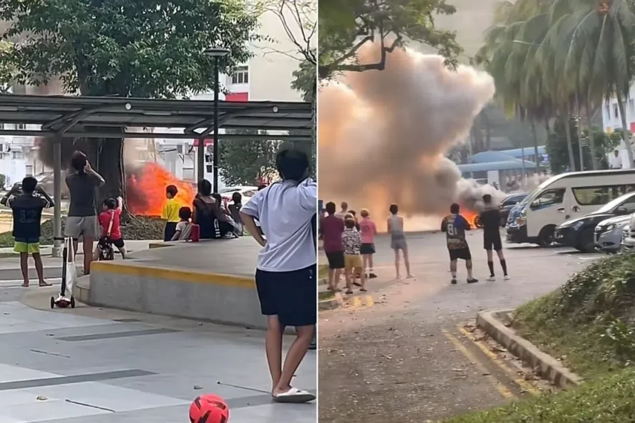Car on fire in Toa Payoh carpark draws crowd, including kids Car on fire in Toa Payoh carpark draws crowd, including kids